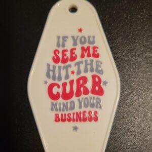 Hit the curb motel keychain