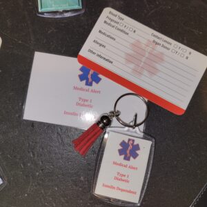 Plastic keychain with matching laminated card.. type diabetes