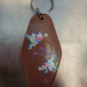 Jesus loves motel keychain